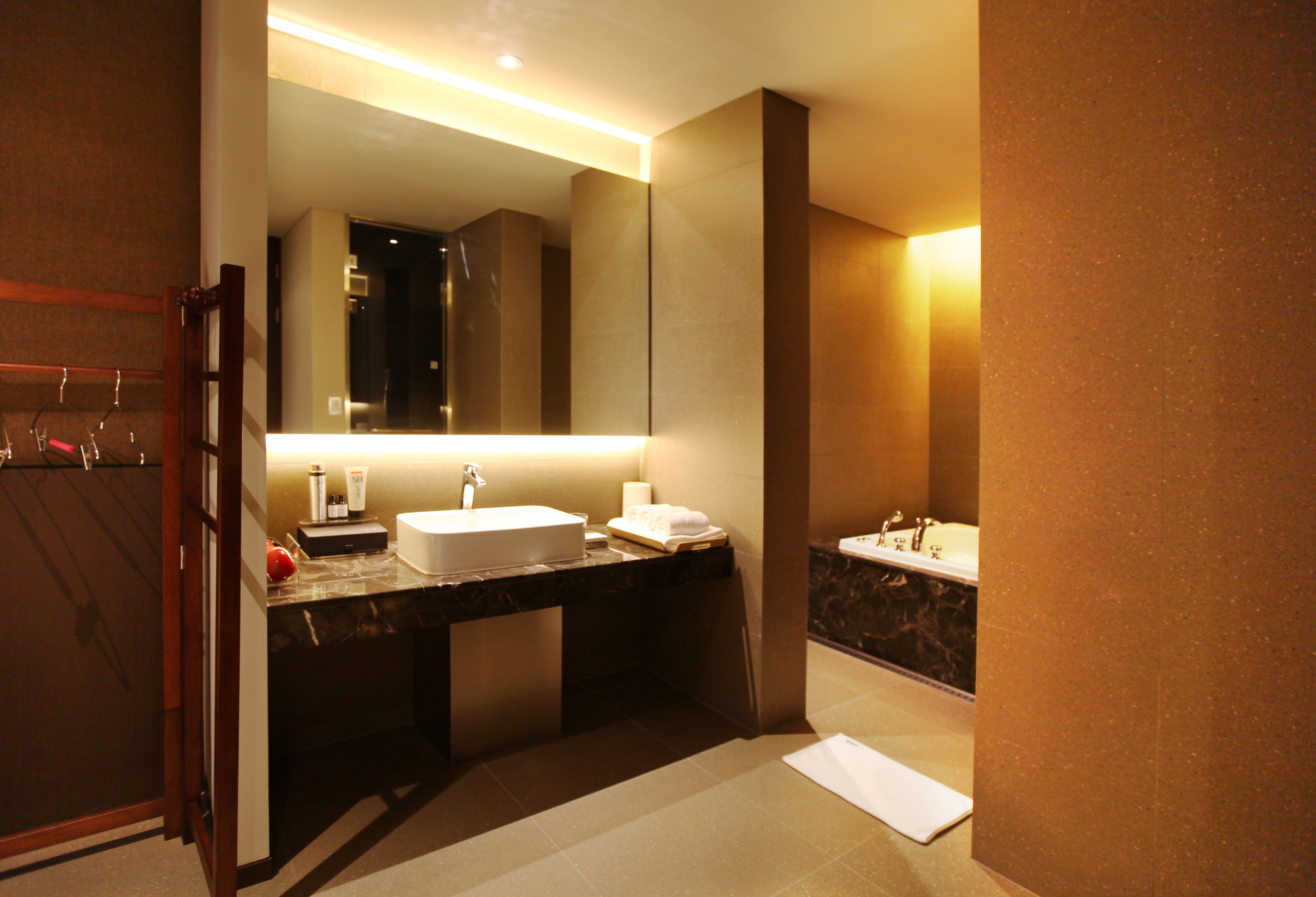 super twin (saturday check-in time: 8 pm) | bathroom | separate bathtub and shower, free toiletries, hair dryer, bathrobes