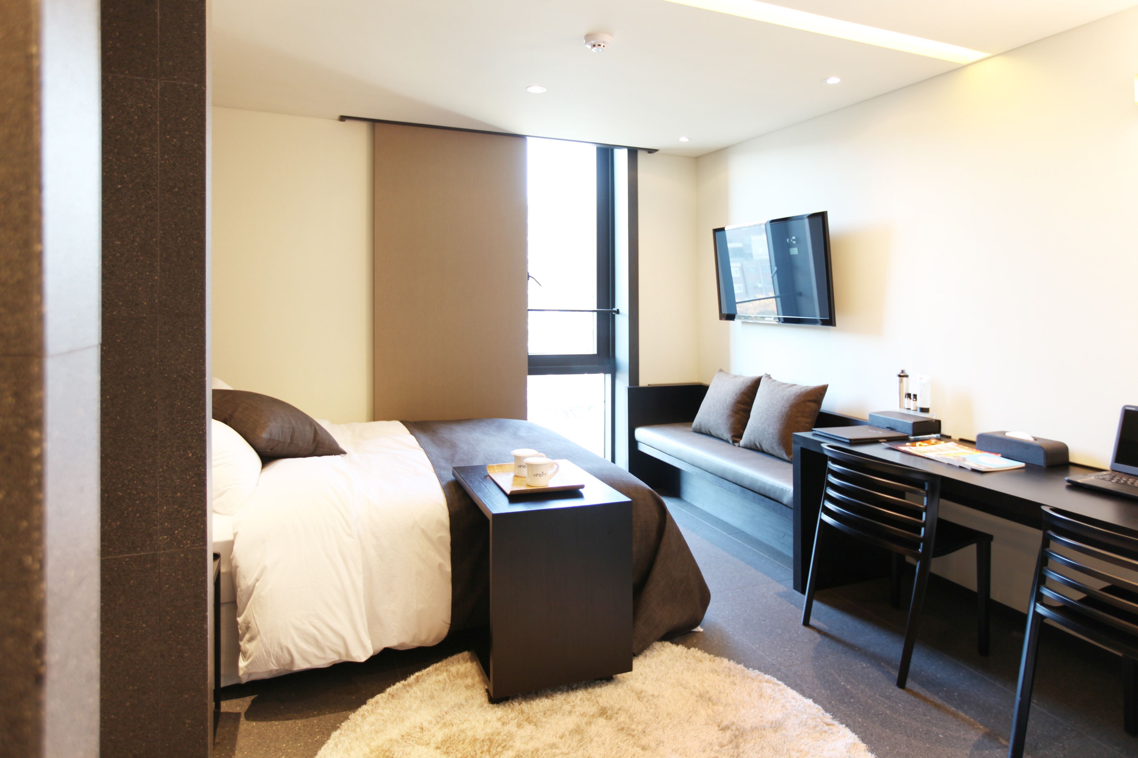 deluxe room (saturday check-in time: 8 pm) | 1 bedroom, down duvets, free minibar, individually decorated