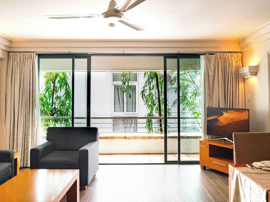 Deluxe Apartment, 2 Bedrooms | Living area | 32-inch TV with cable channels