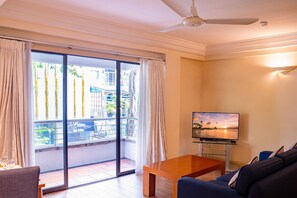 Comfort Apartment, 2 Bedrooms | Living area | 32-inch TV with cable channels - Saigon Apartments (Ho Chi Minh City)