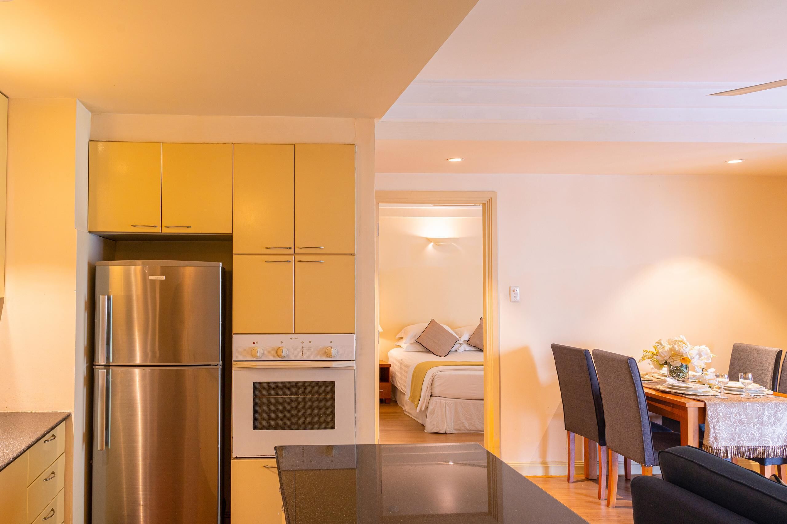 Comfort Apartment, 2 Bedrooms | Living area | 32-inch TV with cable channels