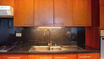 Deluxe Apartment, 2 Bedrooms | Private kitchen | Full-size fridge, microwave, oven, electric kettle