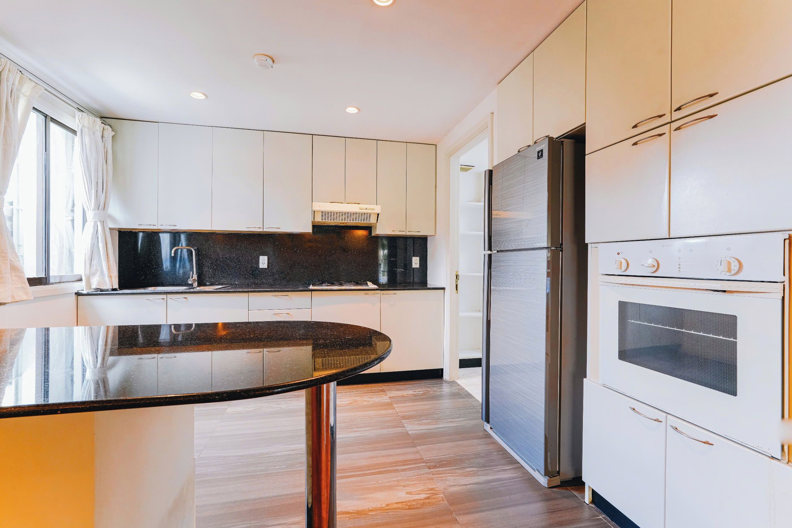 Deluxe Apartment, 2 Bedrooms | Private kitchen | Full-sized fridge, microwave, oven, electric kettle