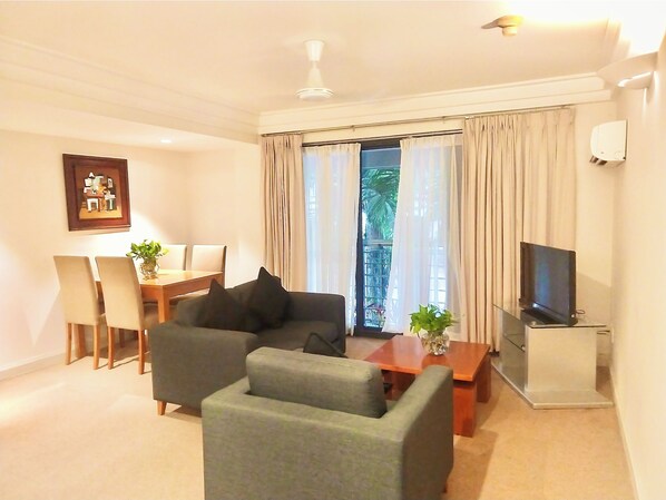 Comfort Apartment, 2 Bedrooms | Living area | 32-inch TV with cable channels
