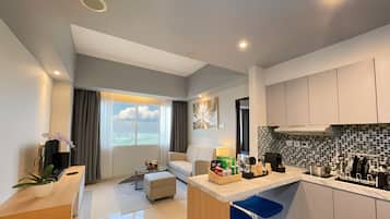 Junior Suite | Living area | 43-inch LCD TV with cable channels