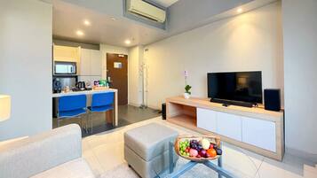 Junior Suite | Living area | 43-inch LCD TV with cable channels