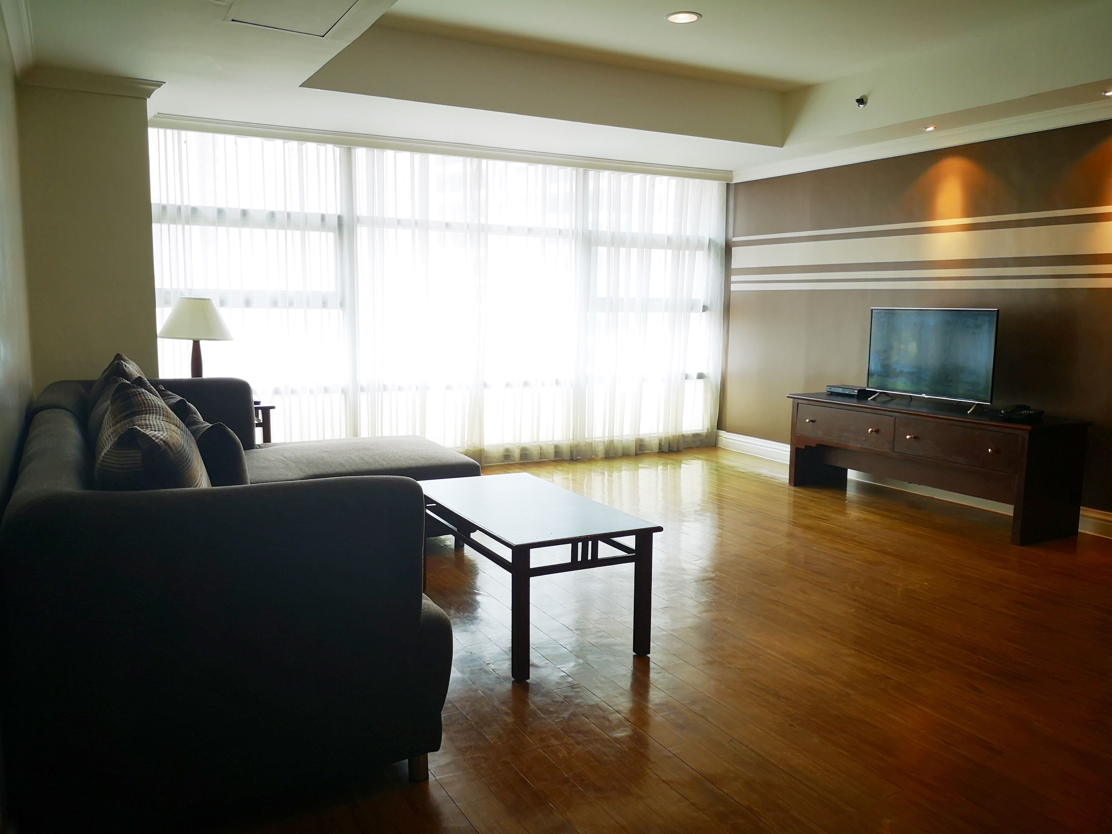 two bedroom suite | living area | flat-screen tv