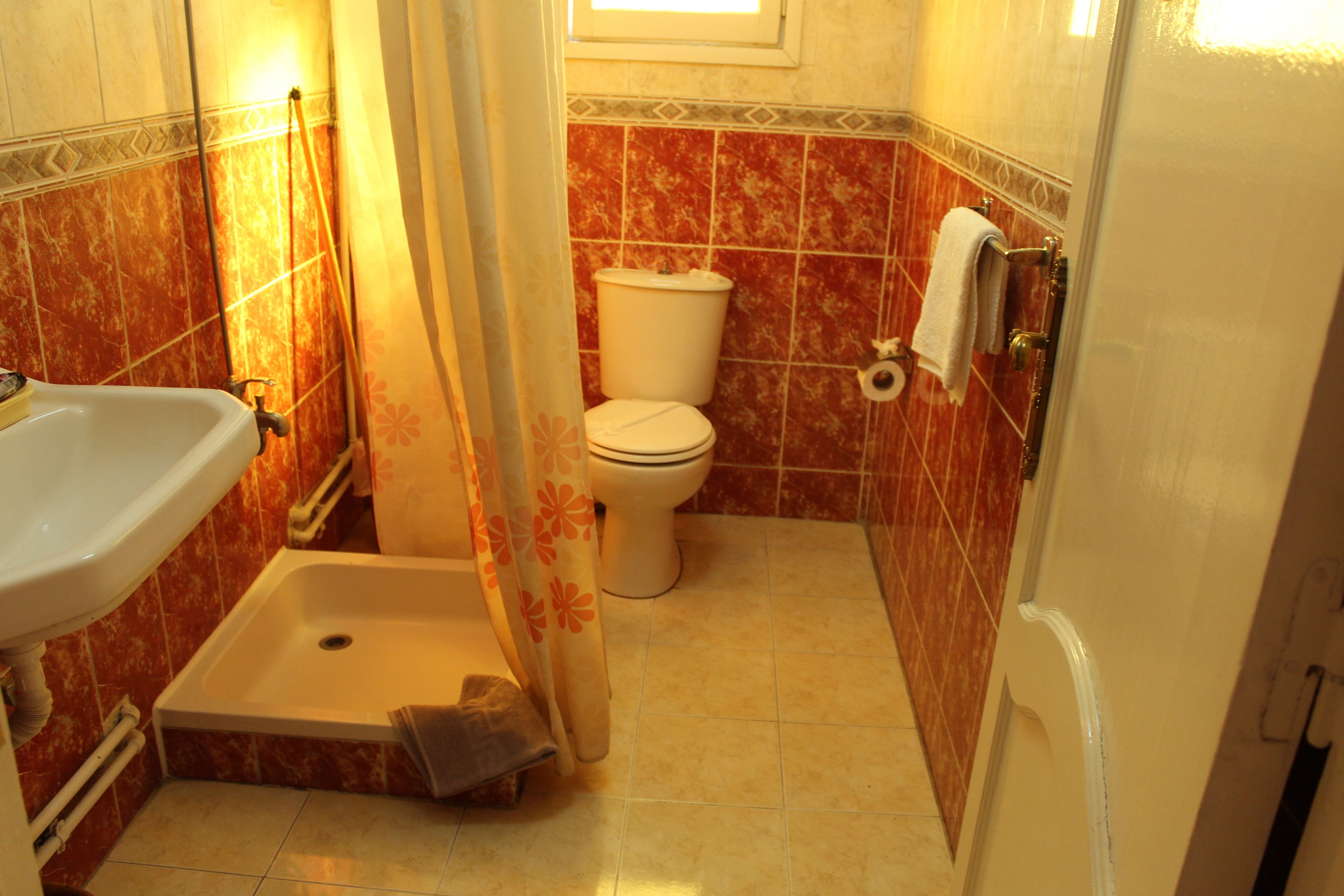 hair dryer, slippers, towels