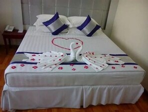 Deluxe Double or Twin Room | Minibar, in-room safe, desk, blackout drapes