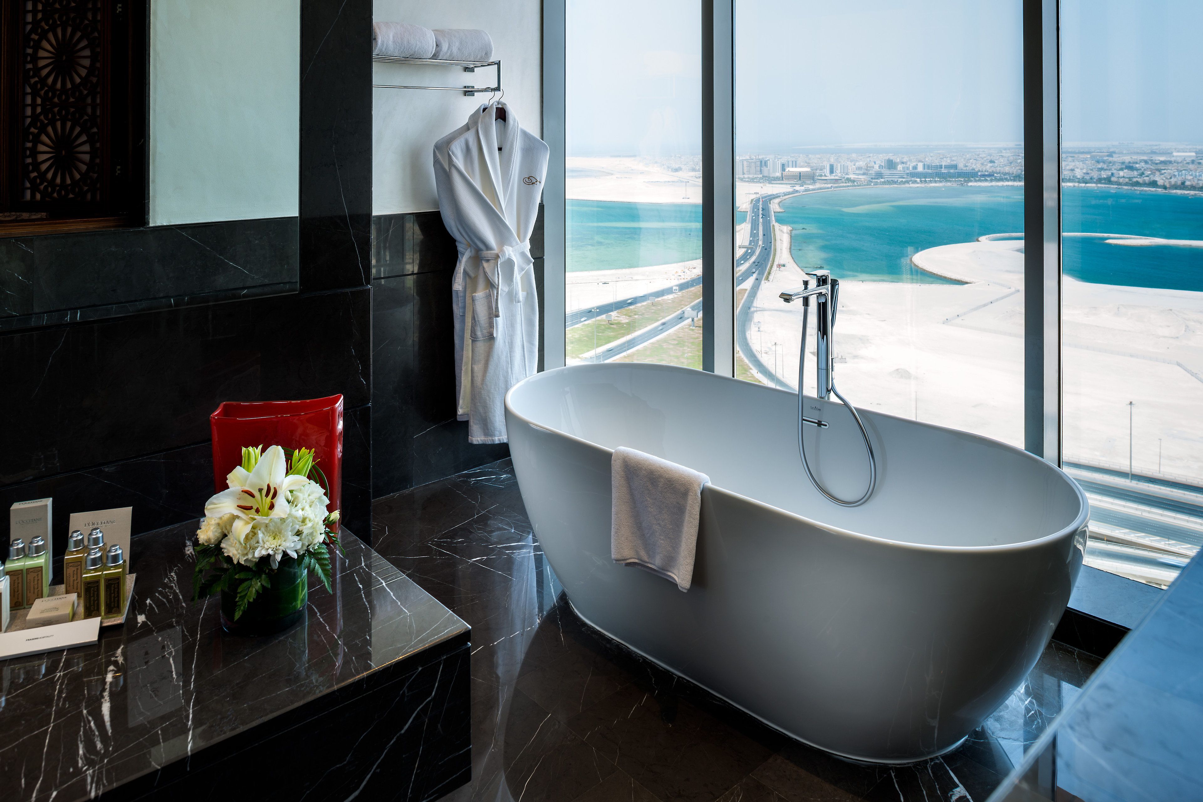 rainfall showerhead, designer toiletries, hair dryer, bathrobes