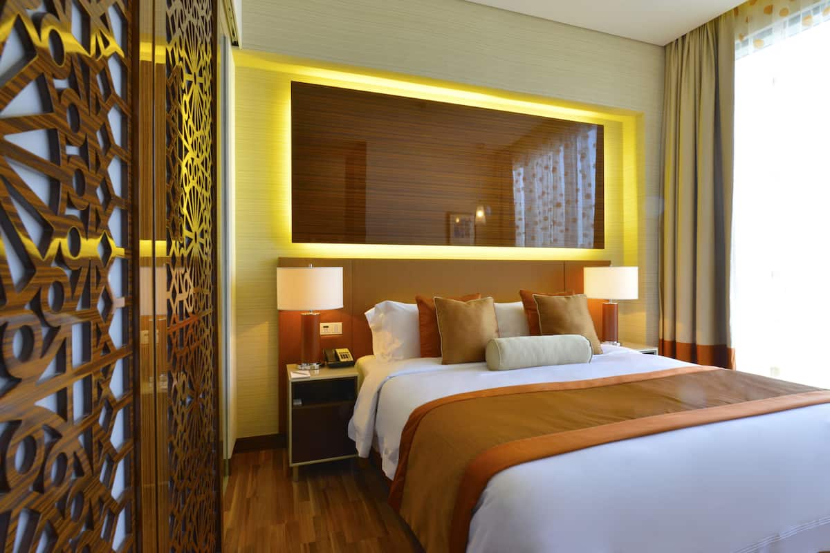 Premium bedding, down duvets, in-room safe, desk