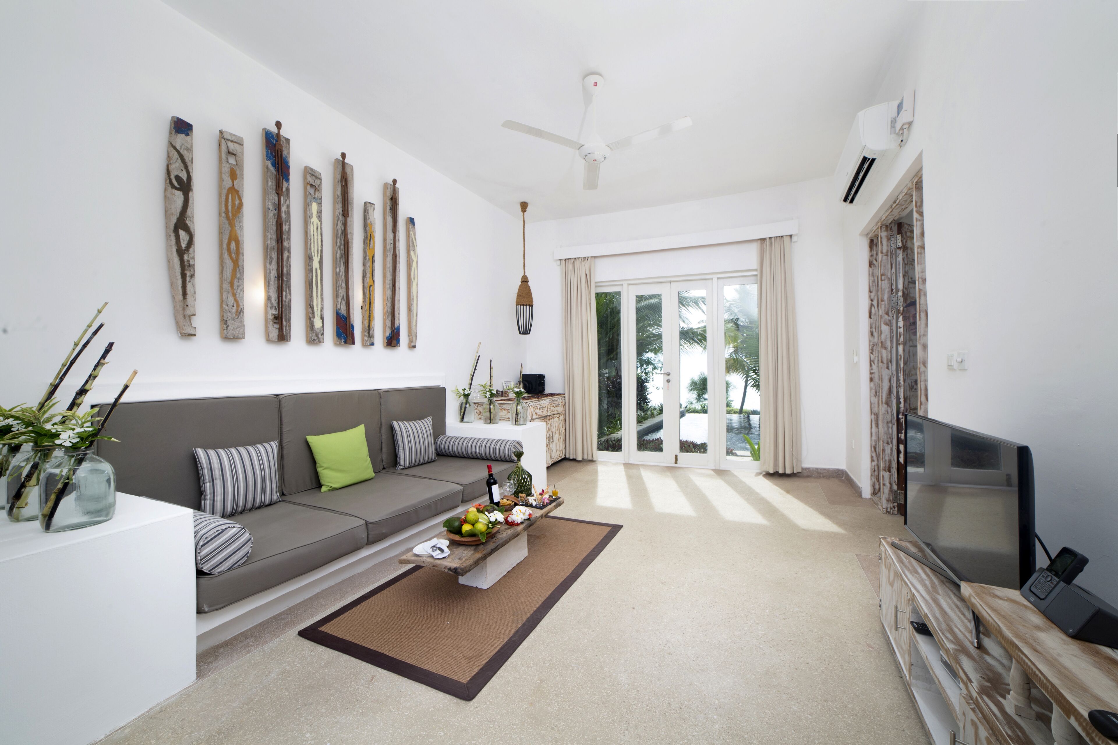 ambassador 2 bedroom villa, private pool ocean front | living area | flat-screen tv