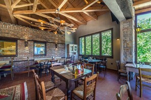 Breakfast, lunch, dinner served; local cuisine