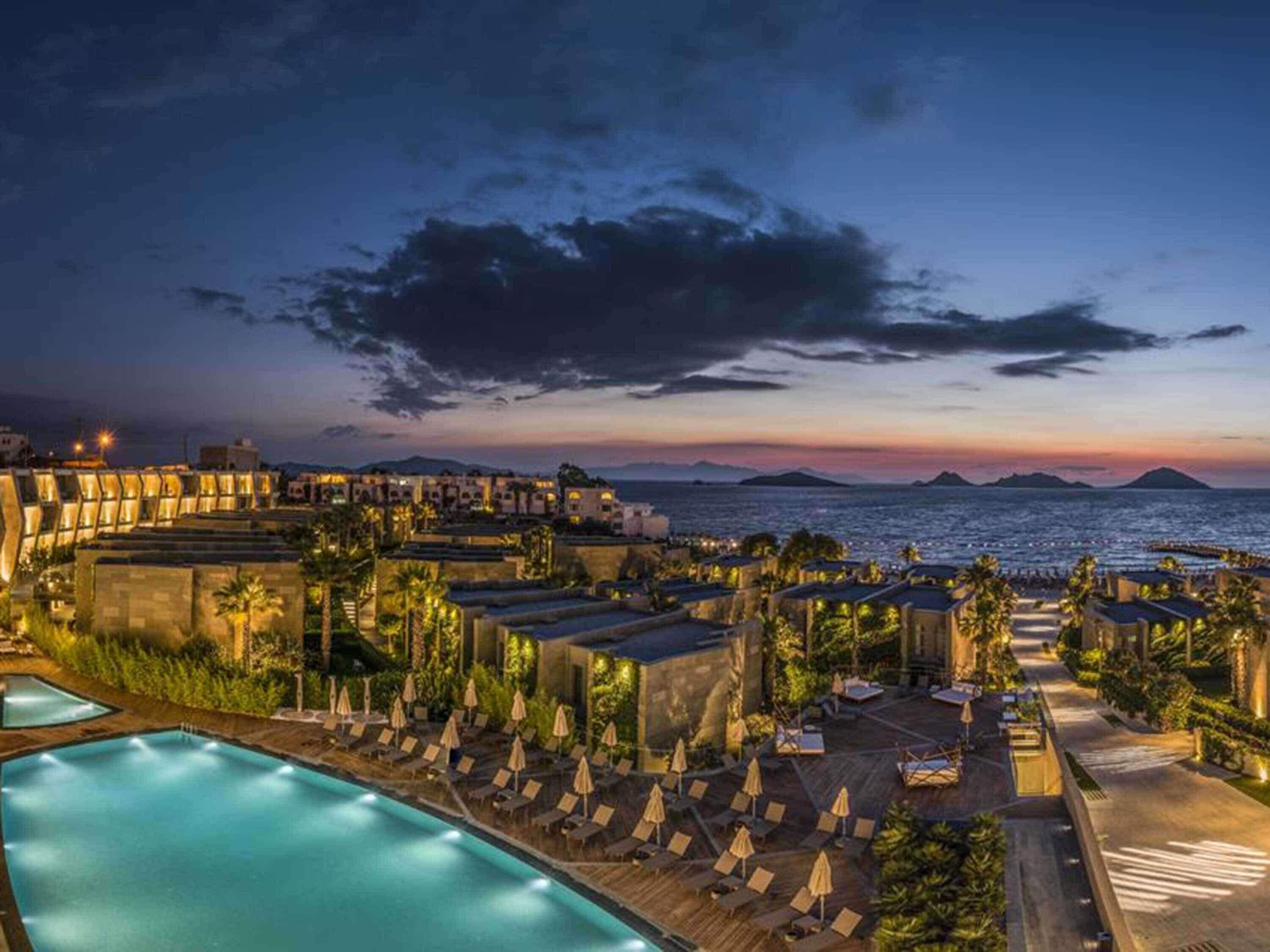 Indoor pool, seasonal outdoor pool, pool umbrellas, sun loungers