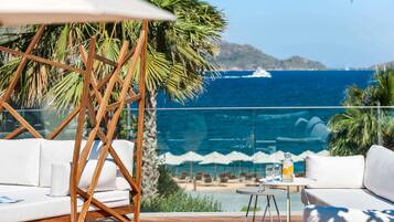 Indoor pool, seasonal outdoor pool, pool umbrellas, pool loungers