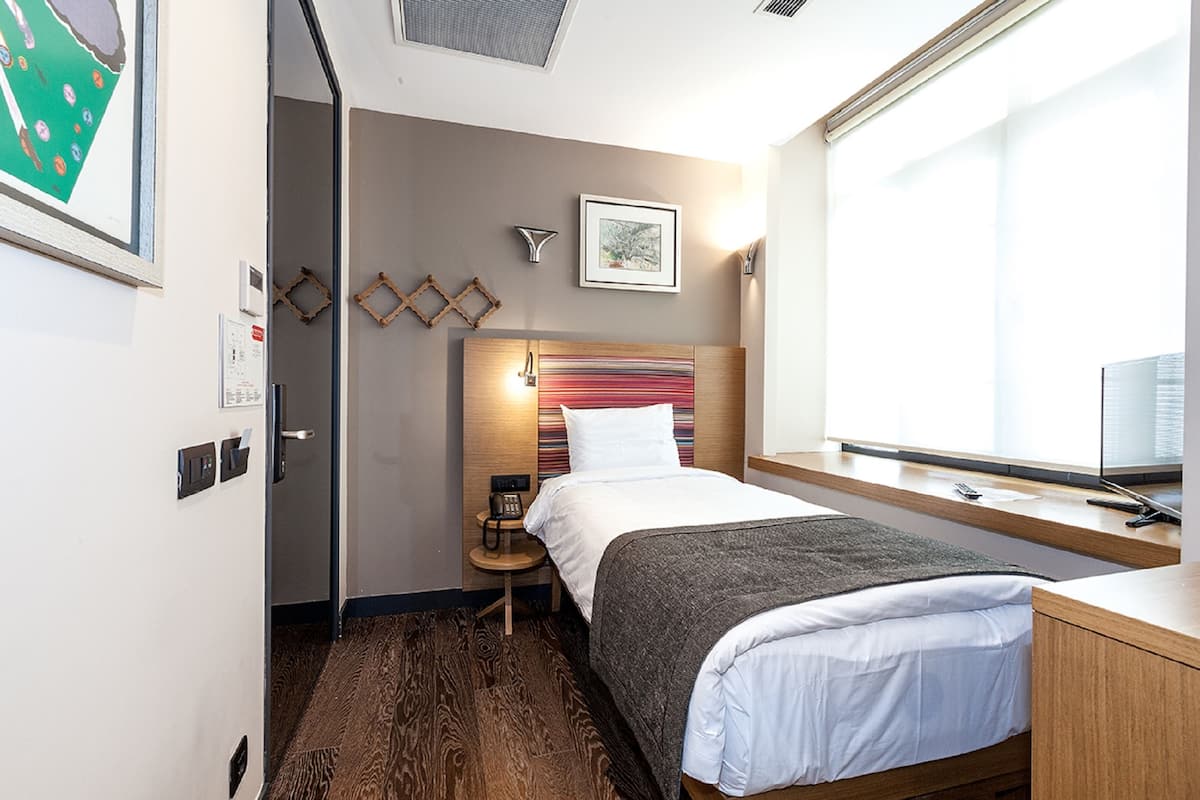 Single Room | Premium bedding, memory-foam beds, minibar, in-room safe