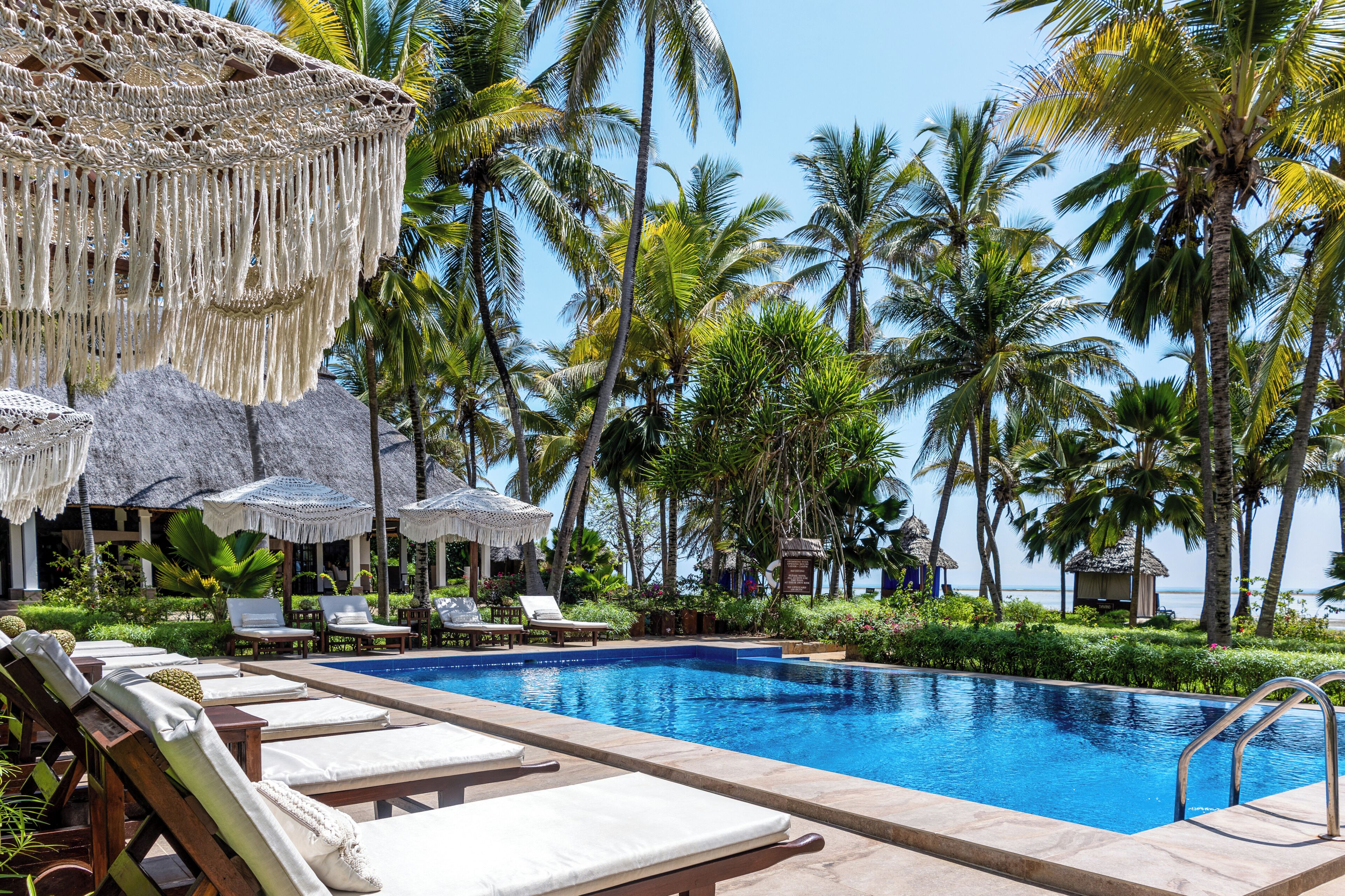 Indoor pool, outdoor pool, pool umbrellas, sun loungers