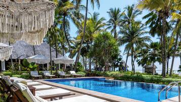 Indoor pool, outdoor pool, pool umbrellas, sun loungers