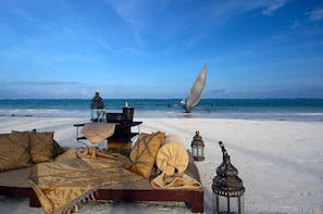 Private beach, white sand, free beach cabanas, sun loungers