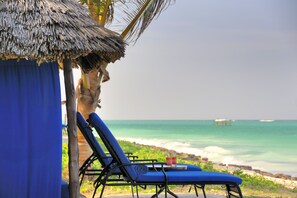 Private beach, white sand, free beach cabanas, sun-loungers