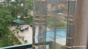 Habitació amb dos llits individuals Deluxe, vistes al jardí | Vista des de l'habitació