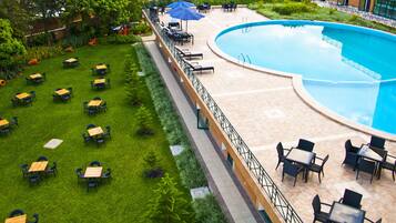 Outdoor pool, open 8 AM to 6 PM, pool umbrellas, sun loungers