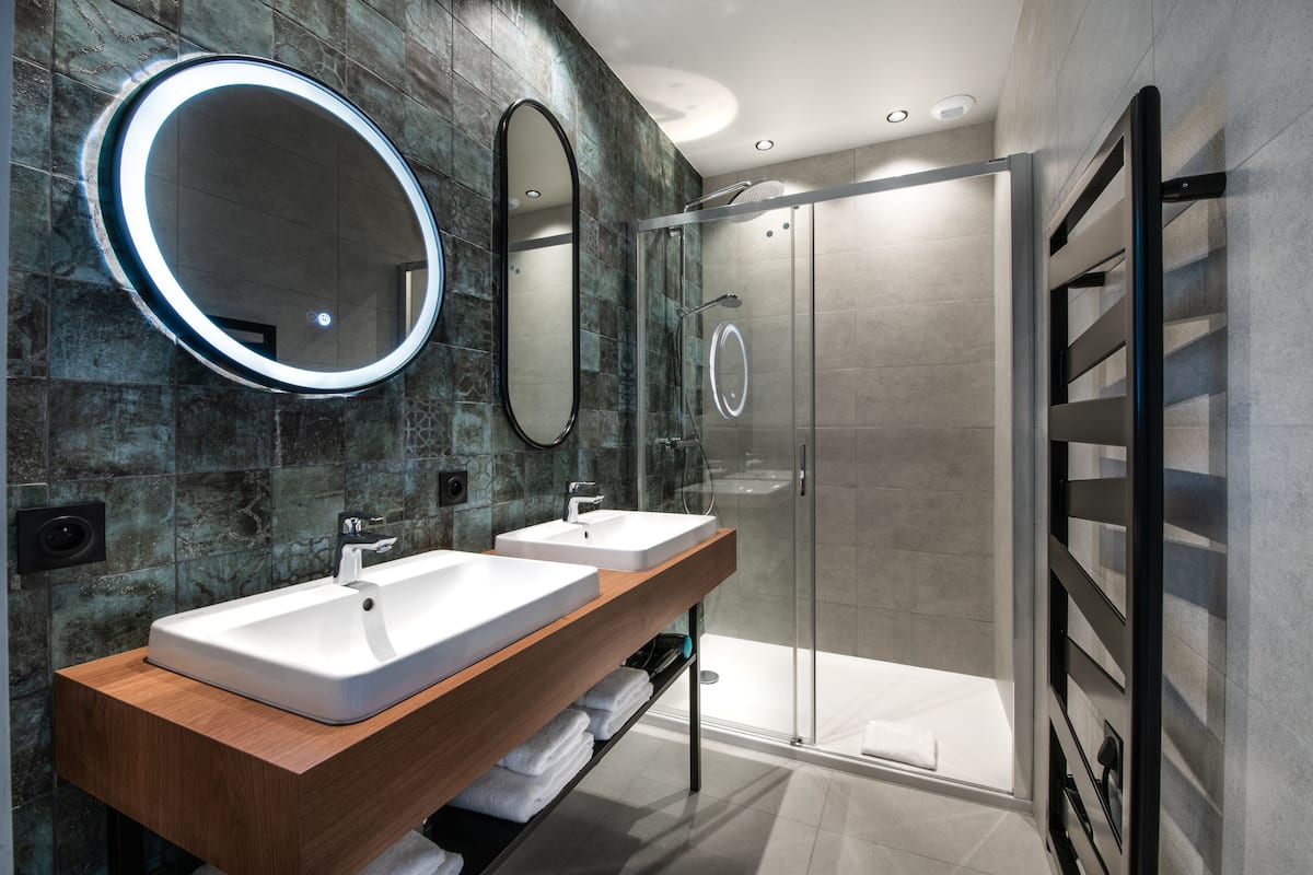 premium quadruple room | bathroom | free toiletries, hair dryer, towels