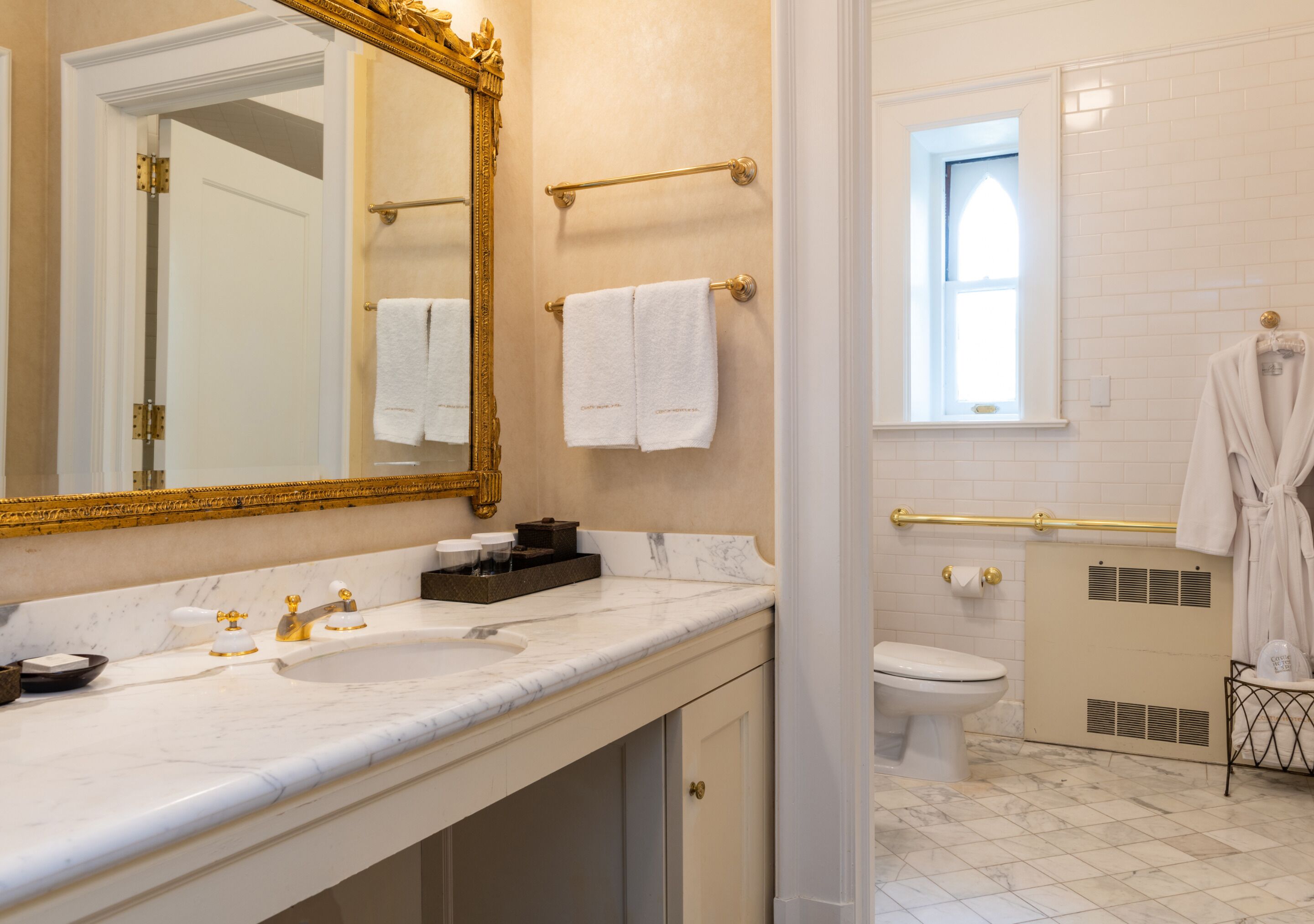 designer toiletries, hair dryer, dressing gowns, towels