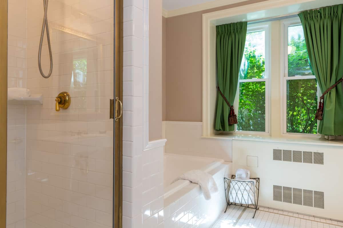 junior suite | bathroom | designer toiletries, hair dryer, dressing gowns, towels