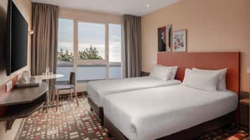 Premium bedding, in-room safe, desk, soundproofing