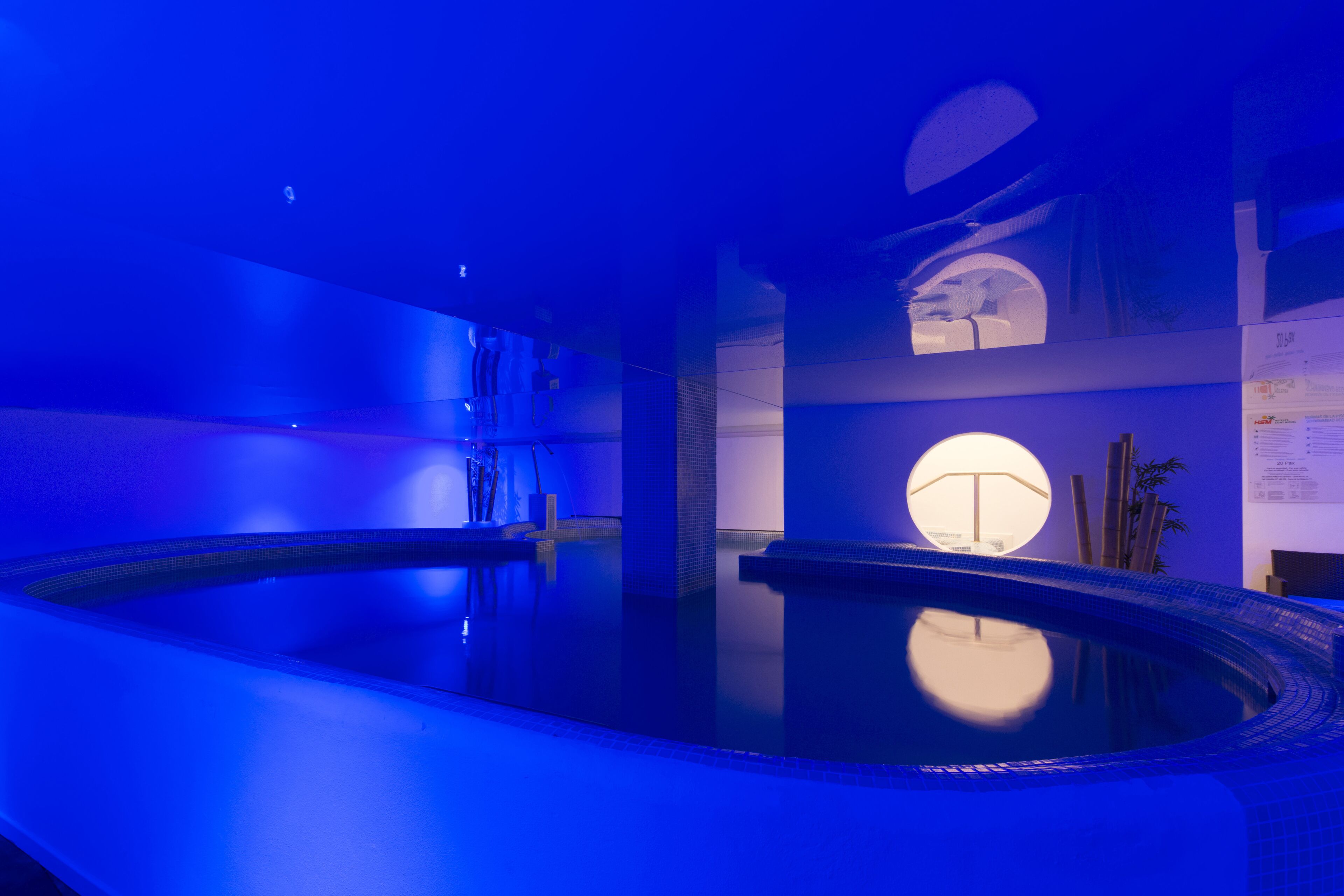 indoor pool, outdoor pool, pool umbrellas, pool loungers