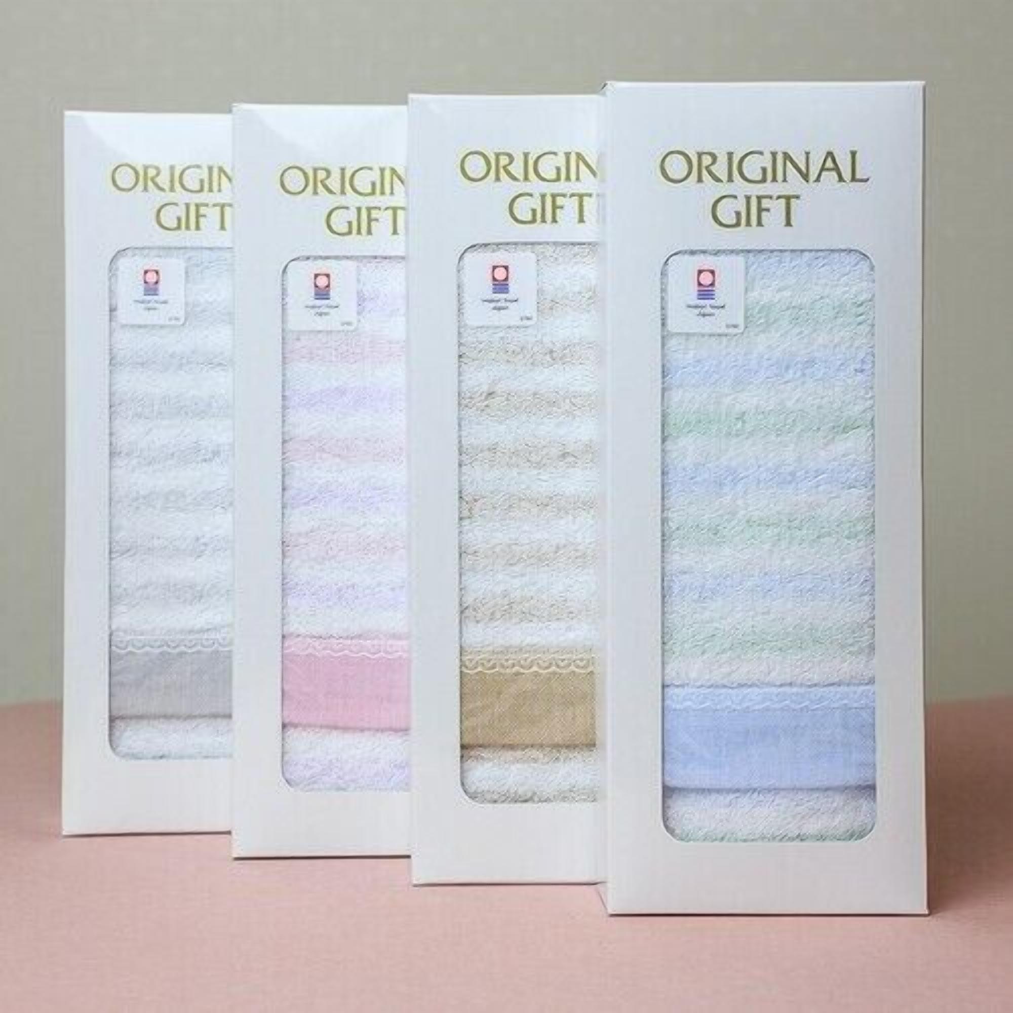 Four boxes of 'ORIGINAL GIFT' with different colored interior patterns.