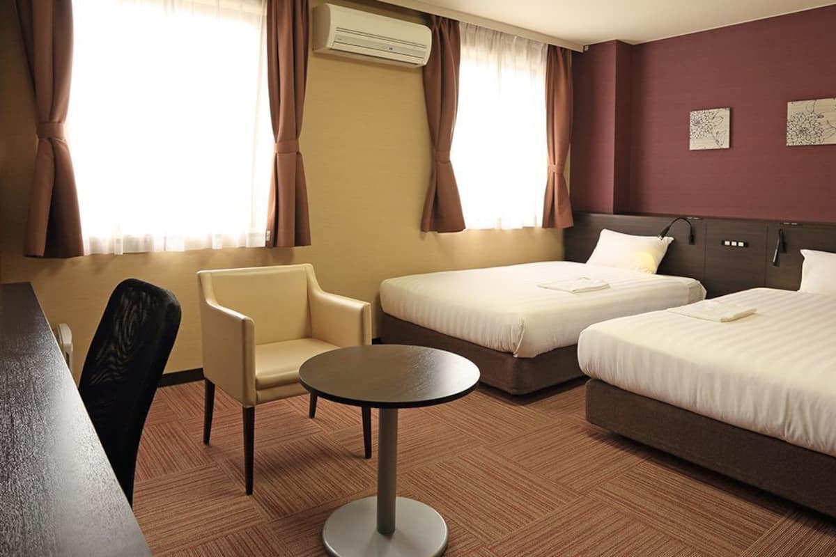 Desk, laptop workspace, blackout curtains, free WiFi