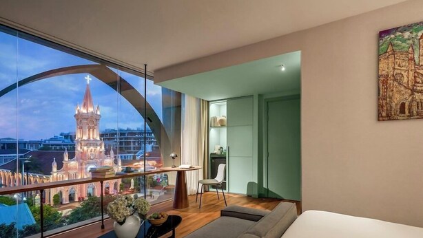 Minibar, in-room safe, desk, soundproofing - M Village Hotel Da Nang Centre, a Brand of Modern Village Lifestyle (Da Nang)
