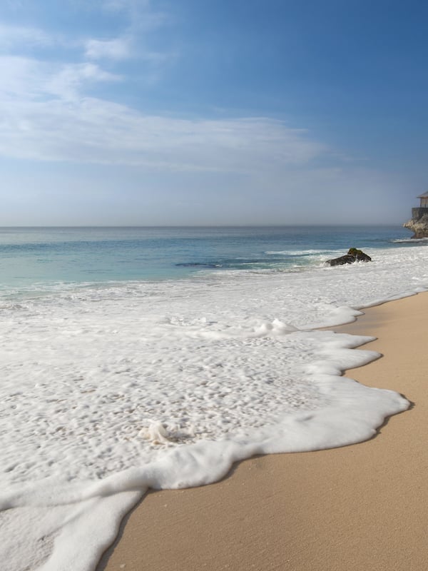 Private beach, white sand, free beach shuttle, beach umbrellas