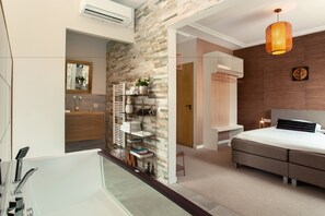 Habitación ejecutiva | Tina de hidromasaje