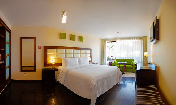 Premium bedding, down duvets, minibar, in-room safe