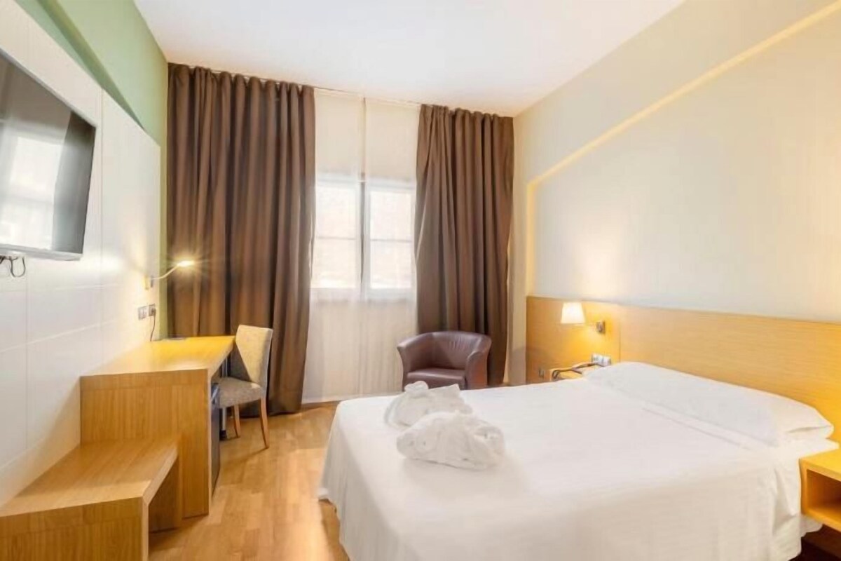 Hypo-allergenic bedding available, minibar, in-room safe, desk