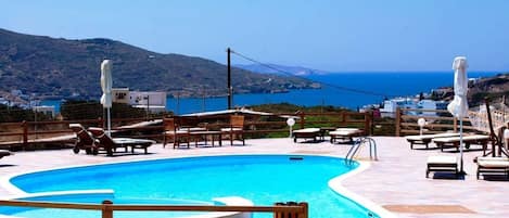 Outdoor pool, pool umbrellas, pool loungers