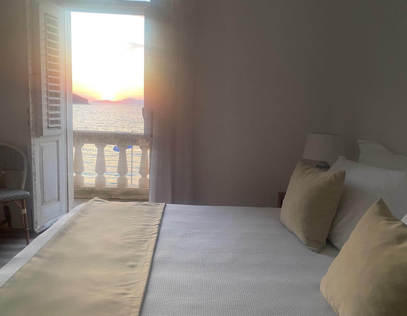 romantic double room, balcony, sea view | in-room safe, desk, iron/ironing board, free wifi