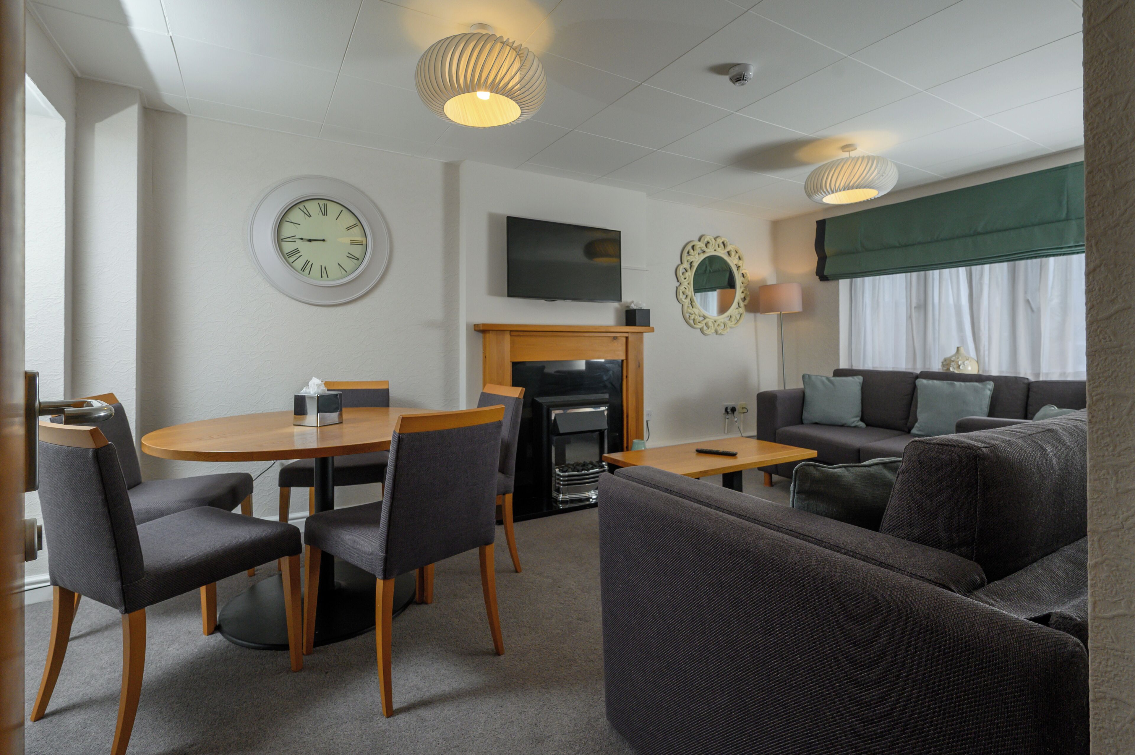 Standard Apartment | Living area | 31-inch flat-screen TV with cable channels, TV