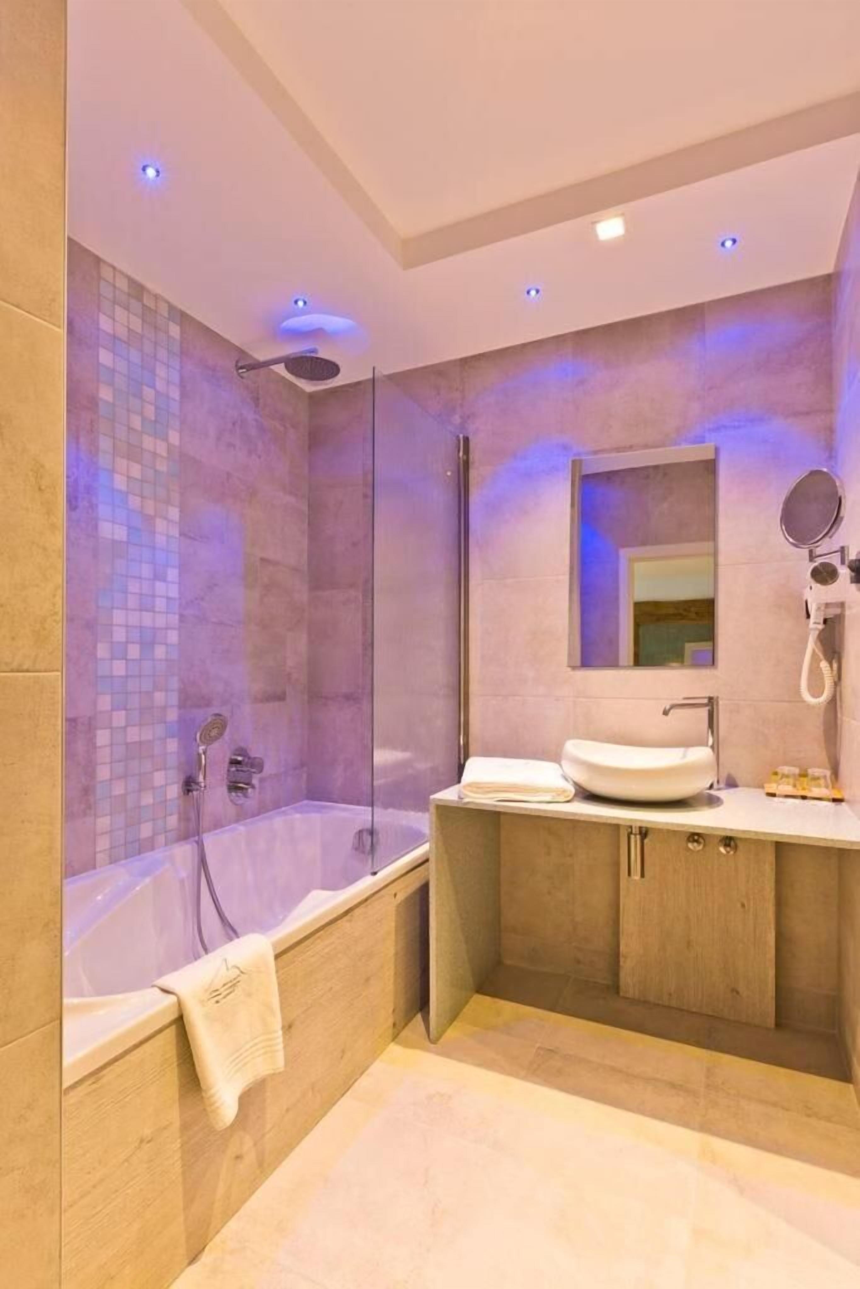 shower, free toiletries, hair dryer, bathrobes