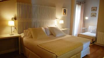 Premium bedding, desk, laptop workspace, blackout curtains