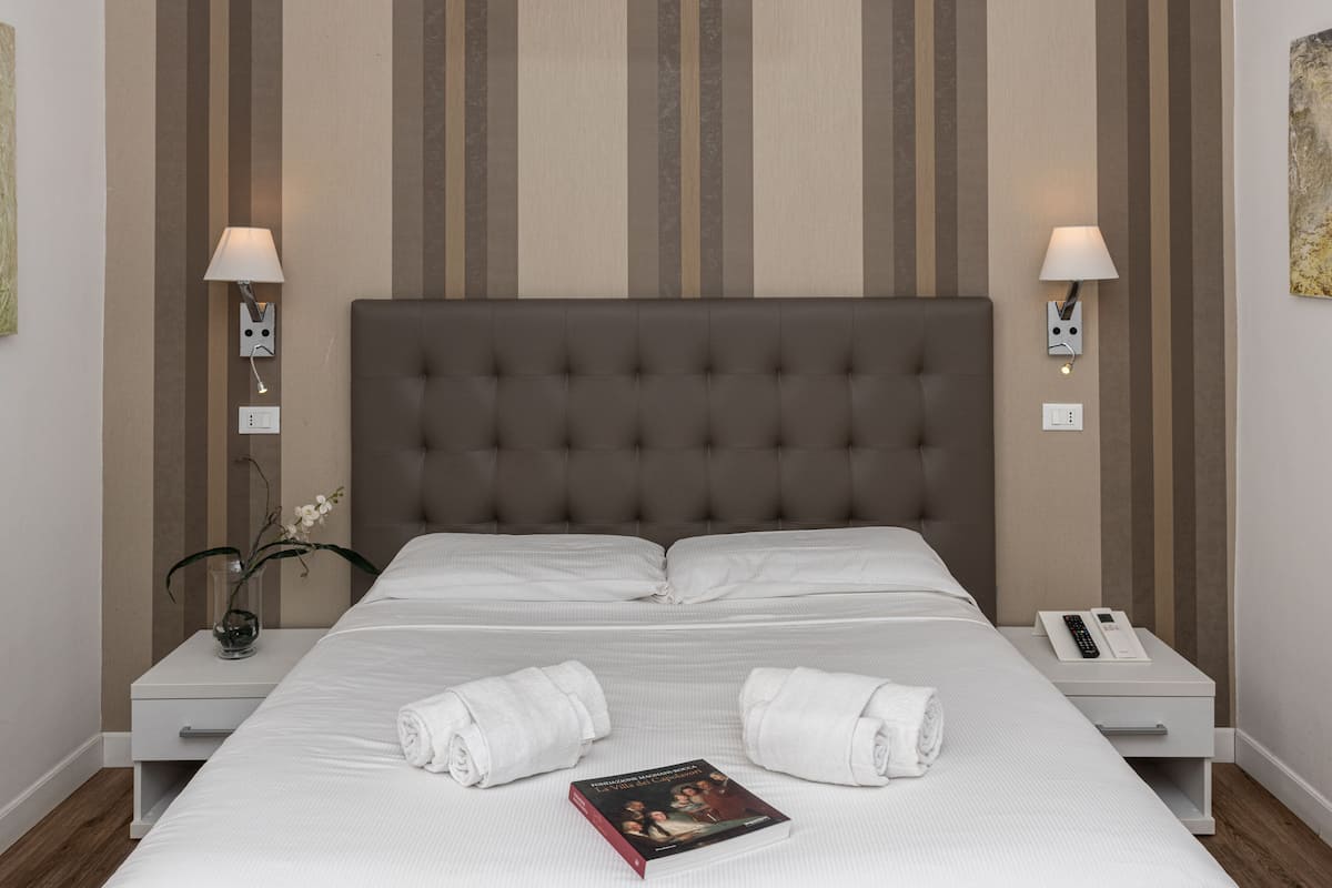 Biancheria da letto di alta qualità, minibar, una cassaforte in camera