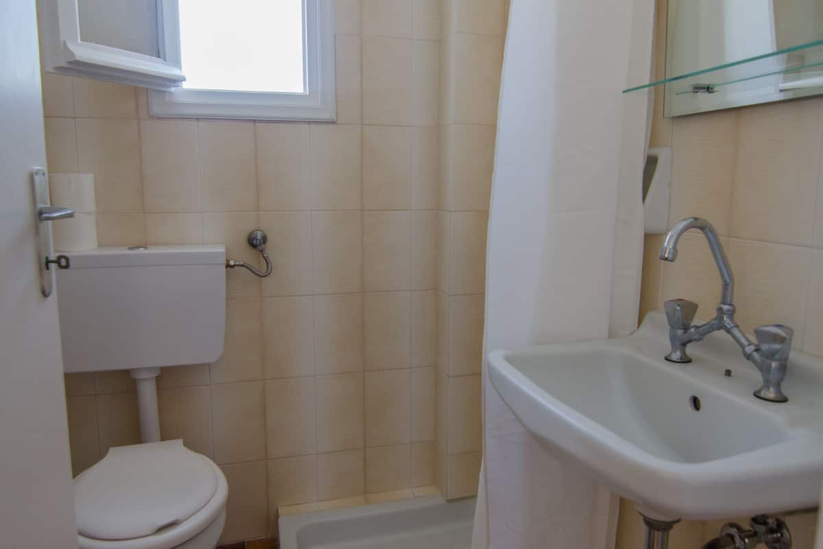triple room | bathroom | shower, rainfall showerhead, hair dryer, towels