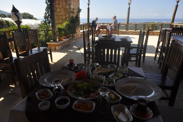 Lunch, dinner served; Mediterranean cuisine, sea views 