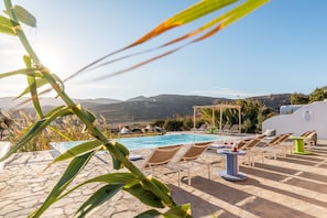Seasonal outdoor pool, sun loungers