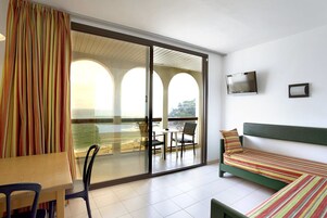 Family Apartment, 1 Bedroom, Balcony, Sea View | Living room | LCD TV