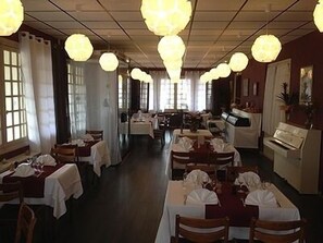 Lunch and dinner served, local cuisine