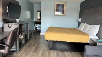 Standard Room, 1 King Bed, Non Smoking | Desk, iron/ironing board, free cribs/infant beds, rollaway beds